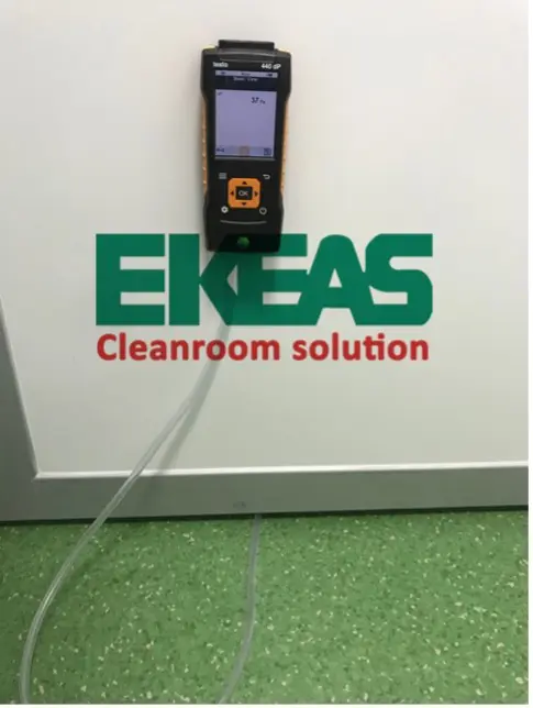 When is the pressure difference test of a cleanroom performed?